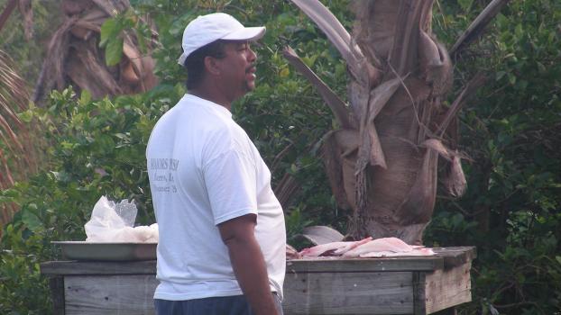 Dudley cleaning fish